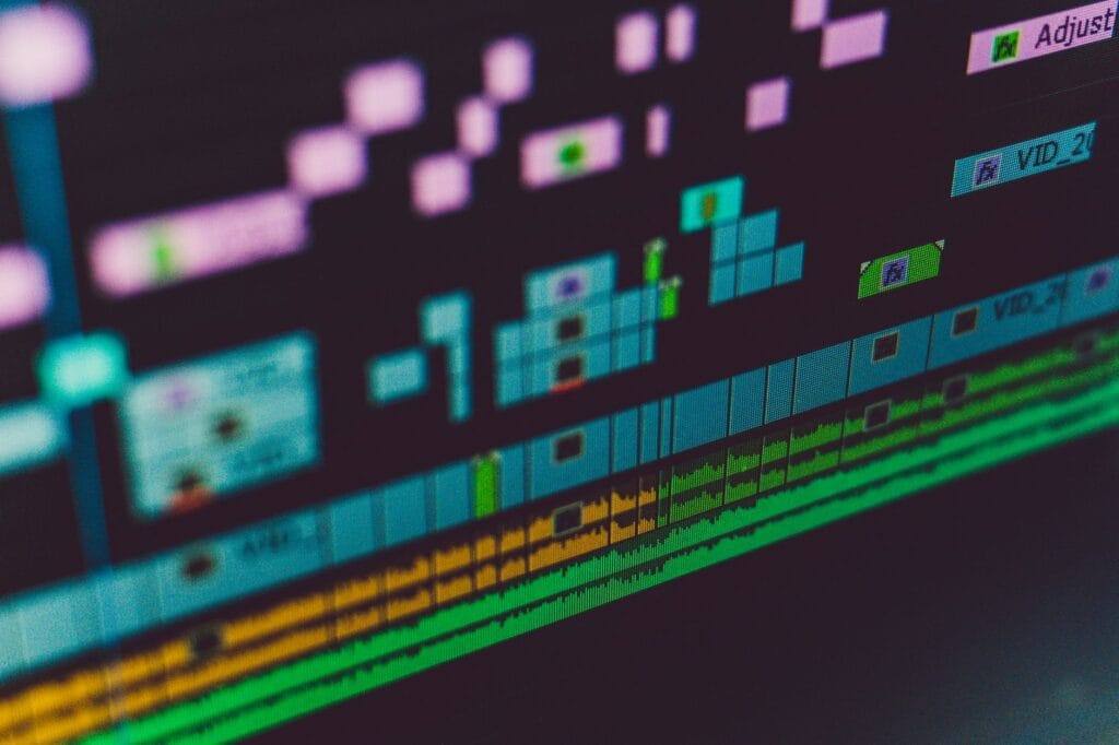 Video editing software timeline showing multi-track video and audio codec processing on a computer screen